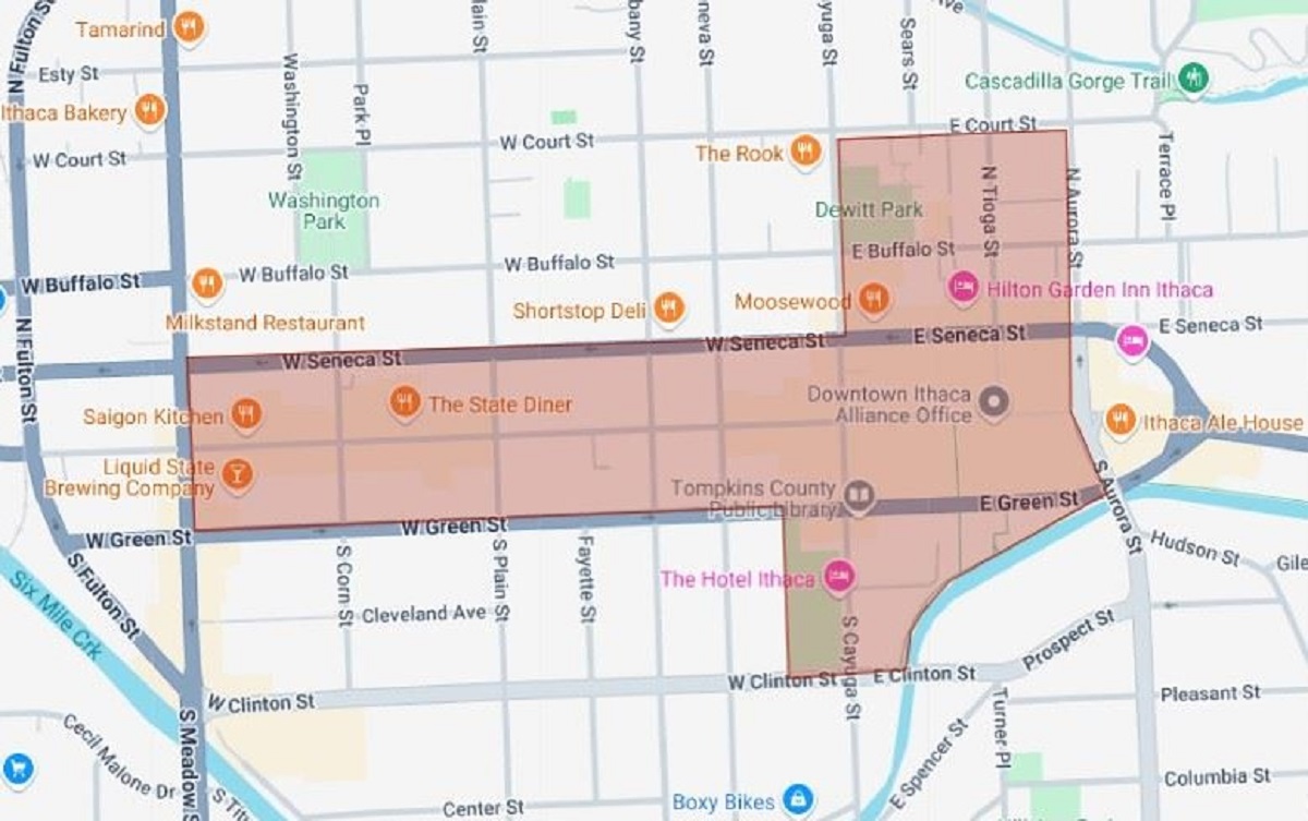 Map with a brown overlay outlining a rectangular district along West Seneca Street in Ithaca, highlighting the area around Downtown Ithaca.