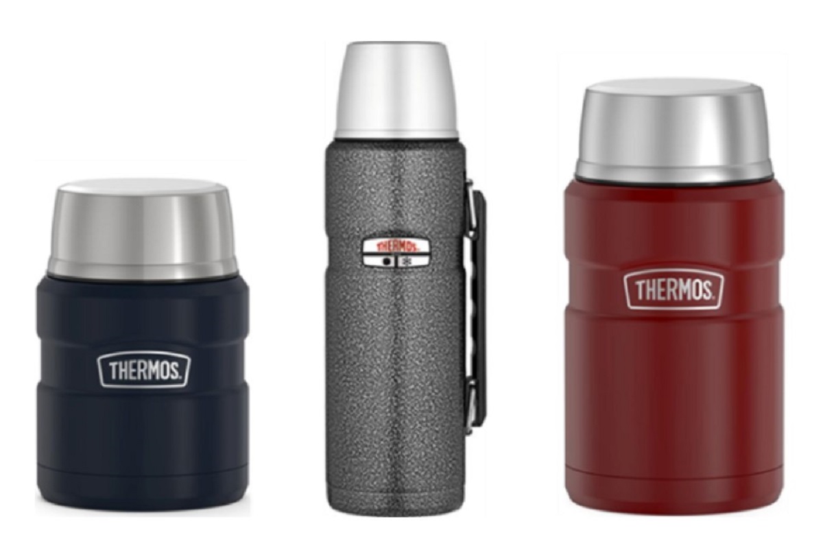 Three Thermos insulated bottles lined up: navy on the left, a gray speckled bottle with a clip in the middle, and red on the right, all with silver lids.