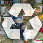 Paint cans piled together with a large translucent recycling symbol overlaid, signaling paint recycling.