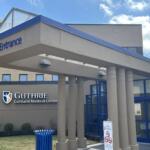 Main Entrance of Guthrie Cortland Medical Center with blue trim and glass doors.