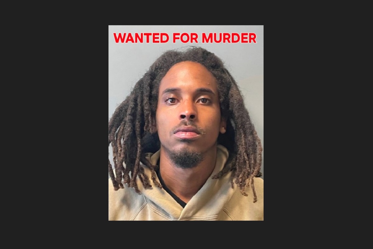 Wanted poster with 'WANTED FOR MURDER' in red text; photo of a man with dreadlocks and a beige hoodie in a mugshot style
