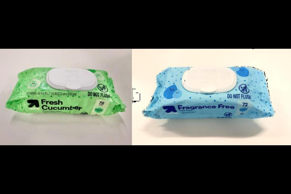 Two wet wipe packs side by side: green cucumber-scented on the left and blue fragrance-free on the right.