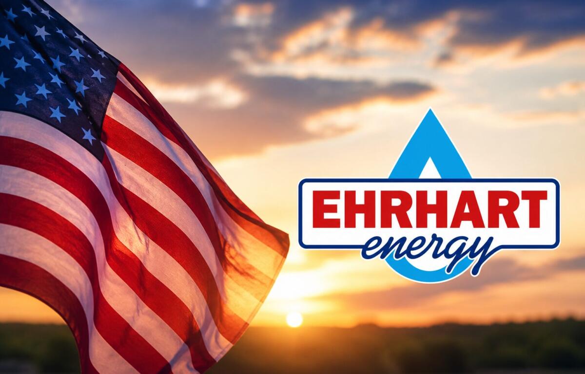 American flag waving at sunset beside the EHRHART Energy logo
