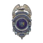 Animal control officer badge: State of New York insignia with an eagle and decorative shield marker, labeled 'Officer' and 'Animal Control' on the badge.